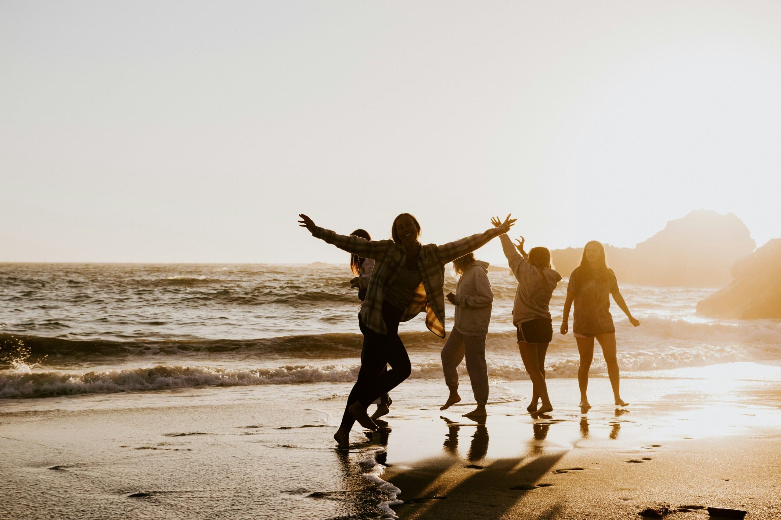 People on a beach happy