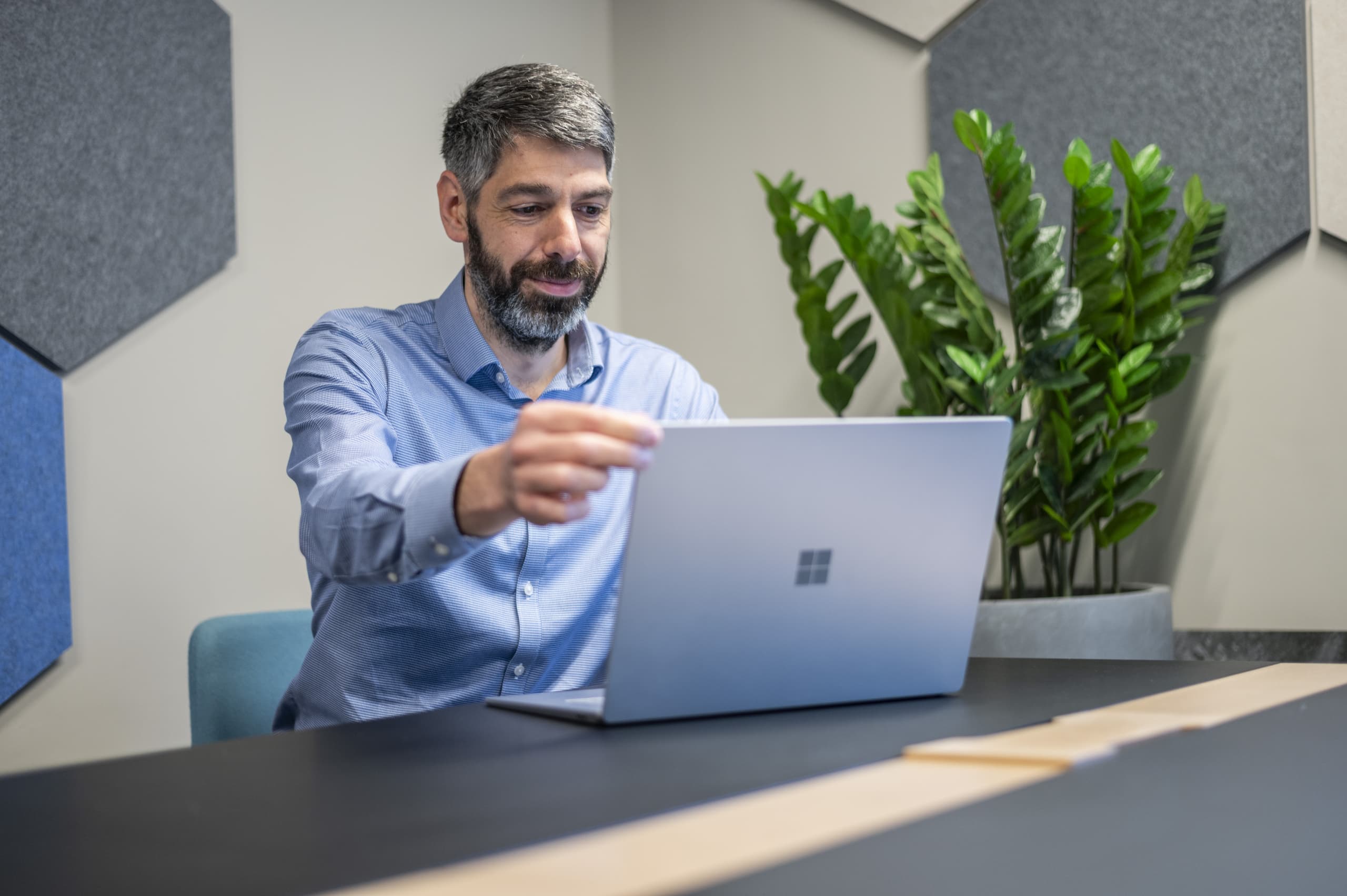 Man looking at a laptop
